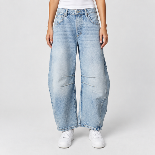 Relaxed Mid Rise Cropped Barrel Leg Jeans in Light Blue, worn on a model.