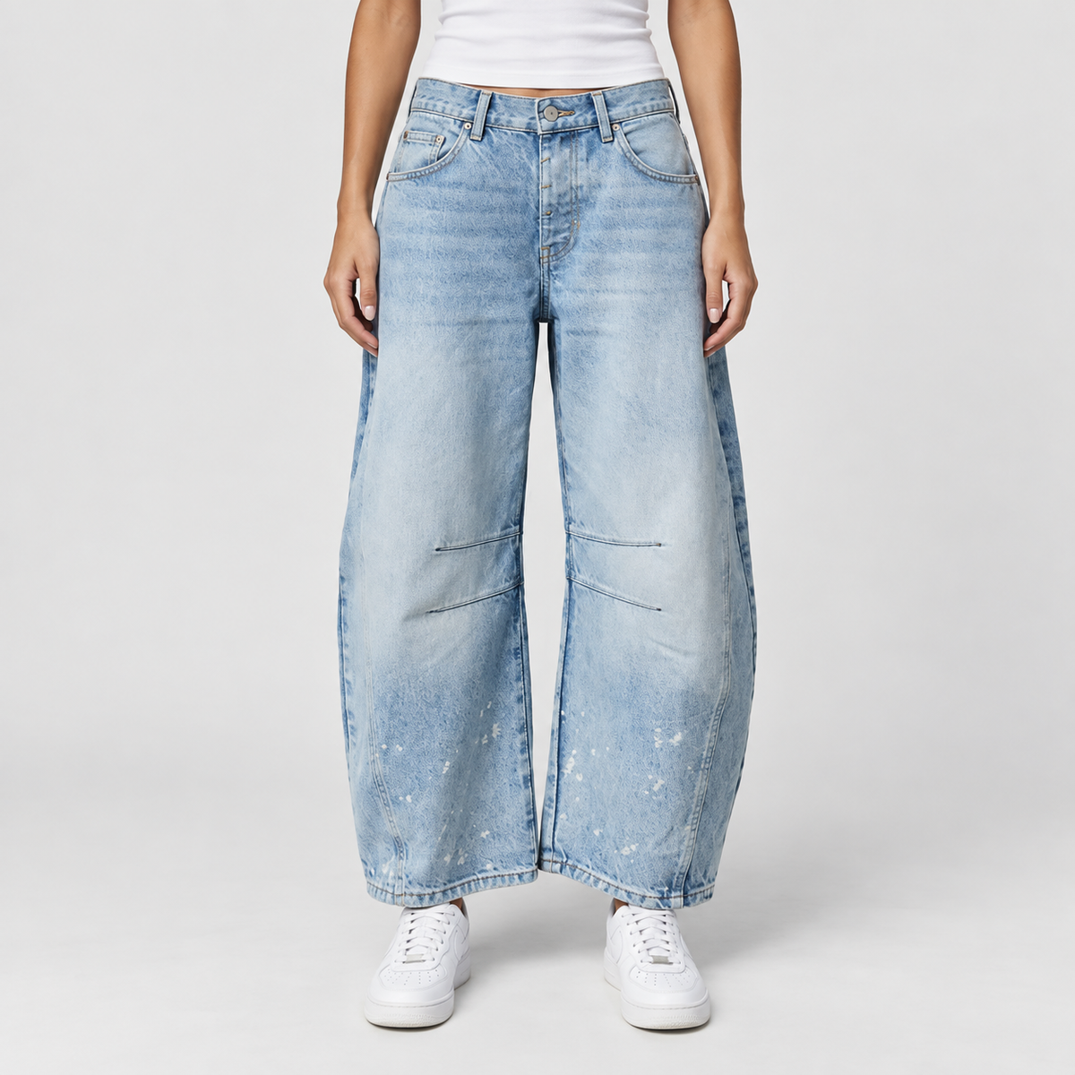 Relaxed Mid Rise Cropped Barrel Leg Jeans, worn on a model.