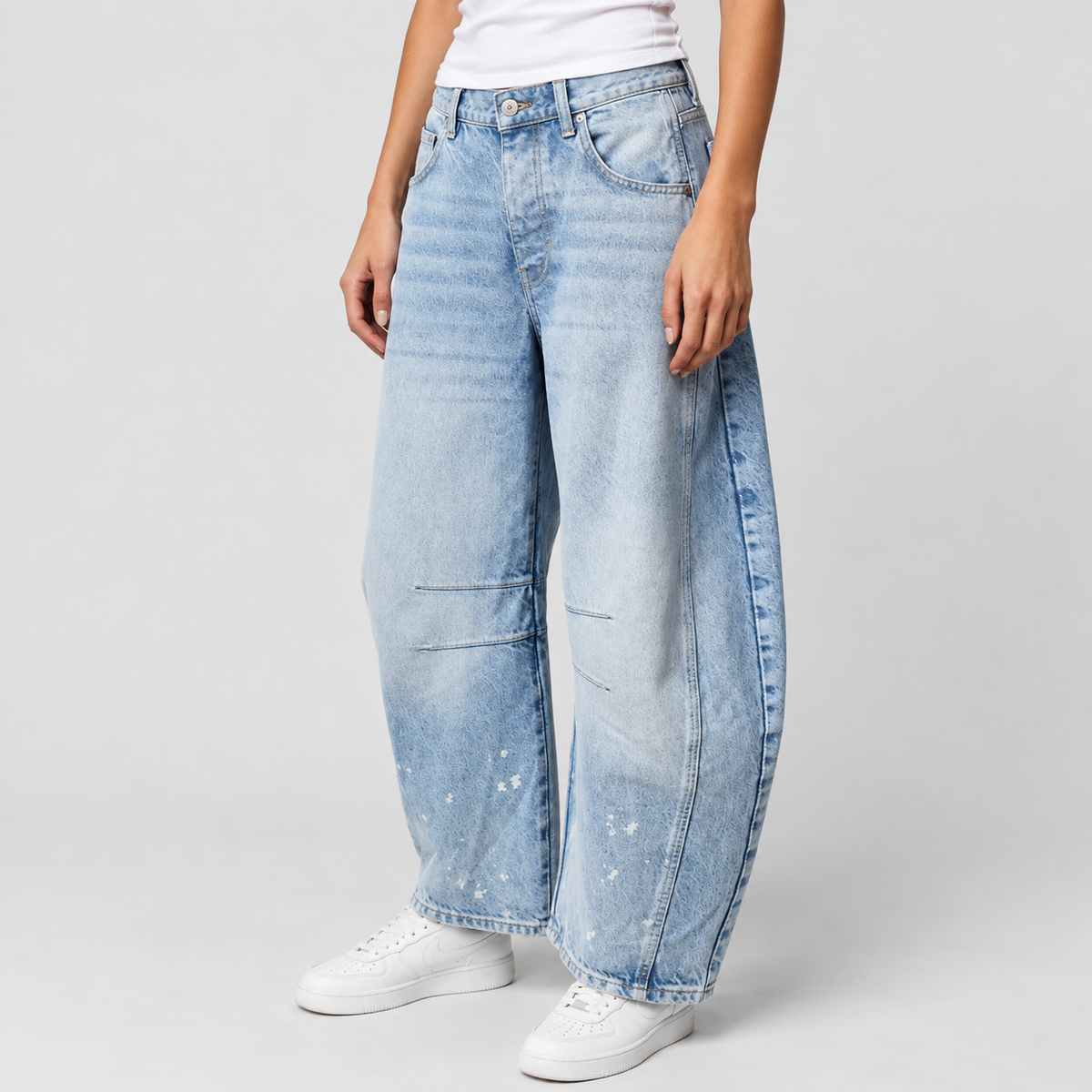 Relaxed Mid Rise Cropped Barrel Leg Jeans, worn on a model.