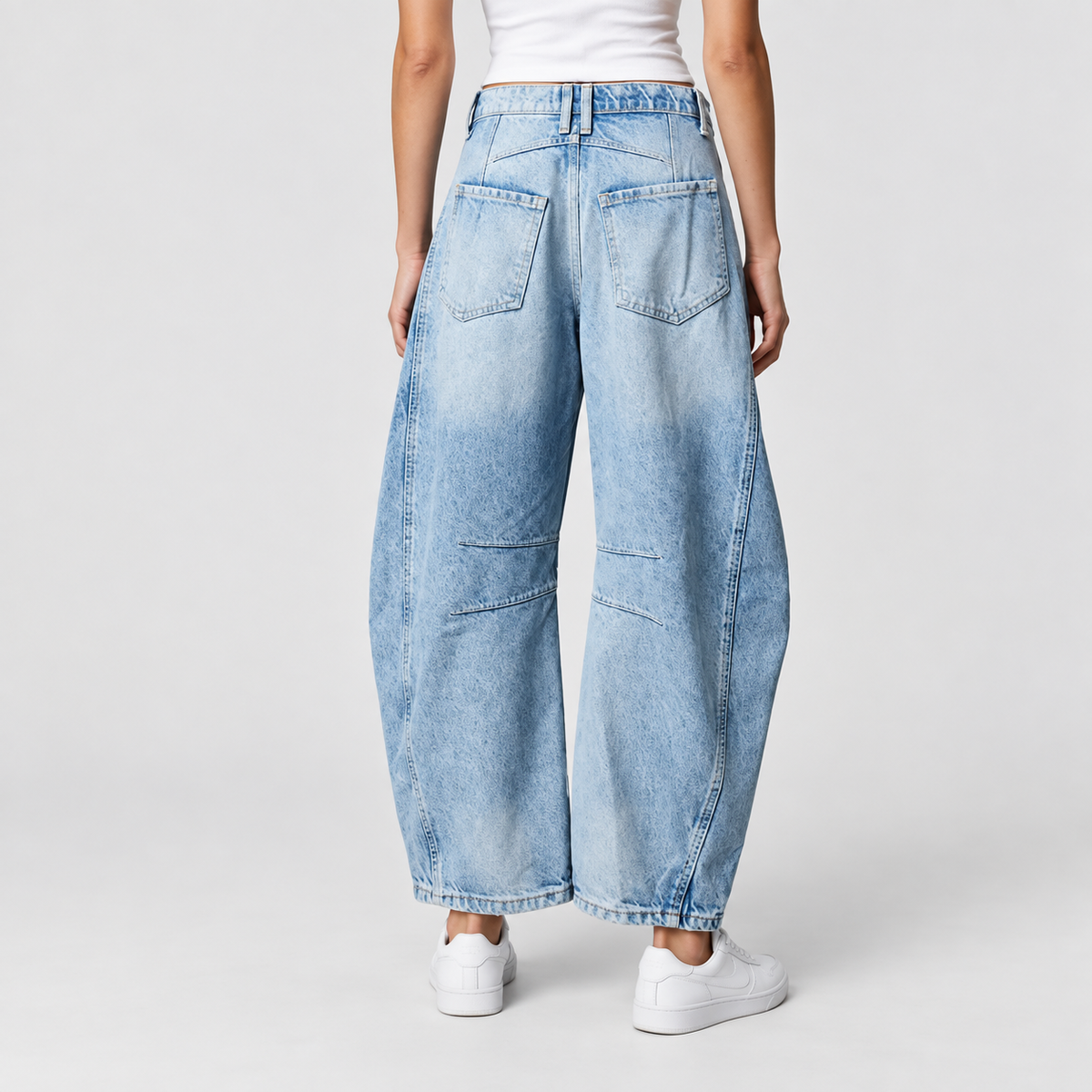 Relaxed Mid Rise Cropped Barrel Leg Jeans, worn on a model.