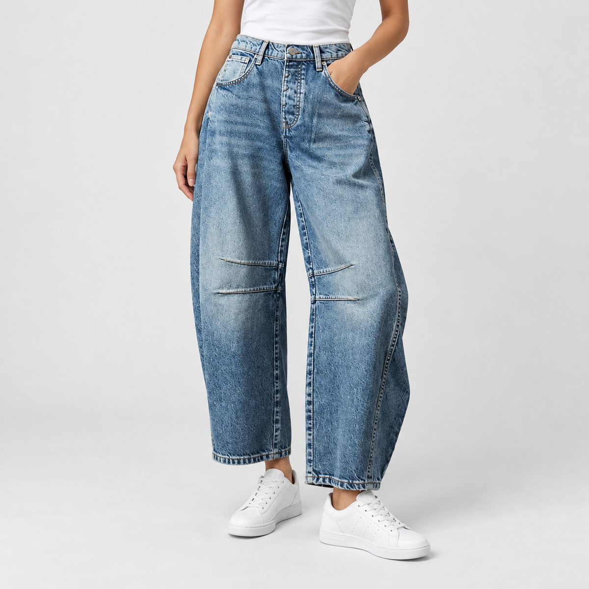 Relaxed Mid Rise Cropped Barrel Leg Jeans in Dark Blue, worn on a model.