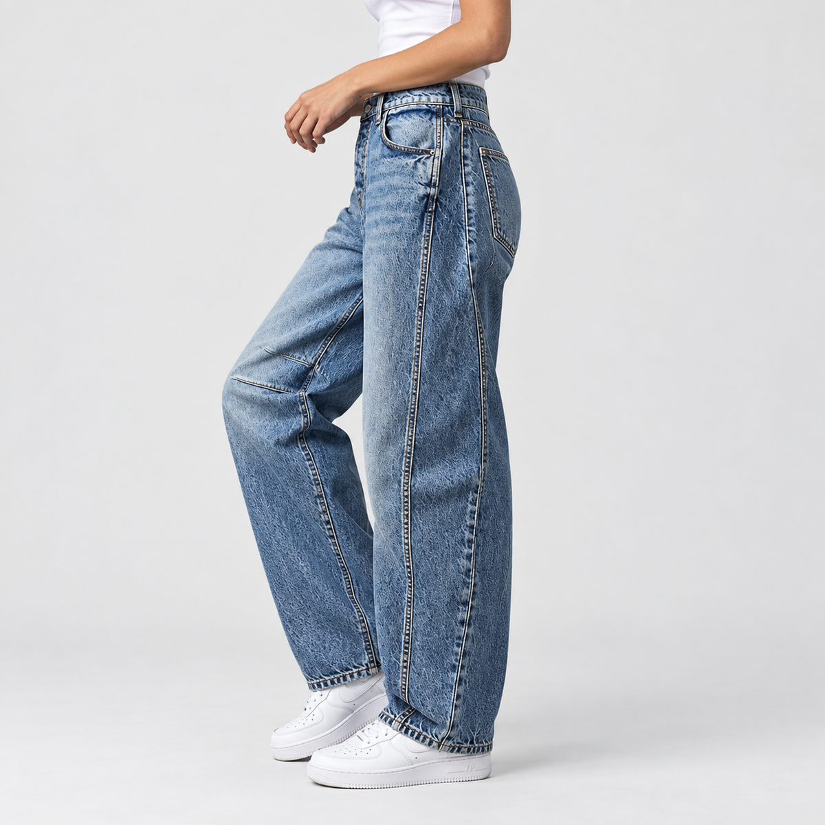 Relaxed Mid Rise Cropped Barrel Leg Jeans, worn on a model.