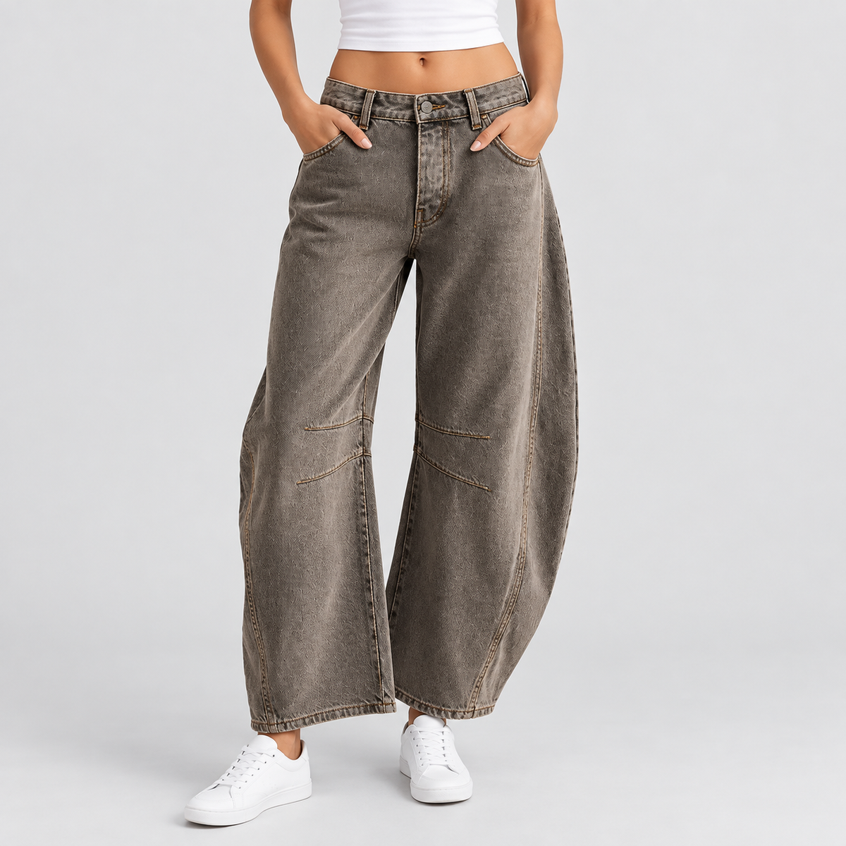 Relaxed Mid Rise Cropped Barrel Leg Jeans in Taupe, worn on a model.