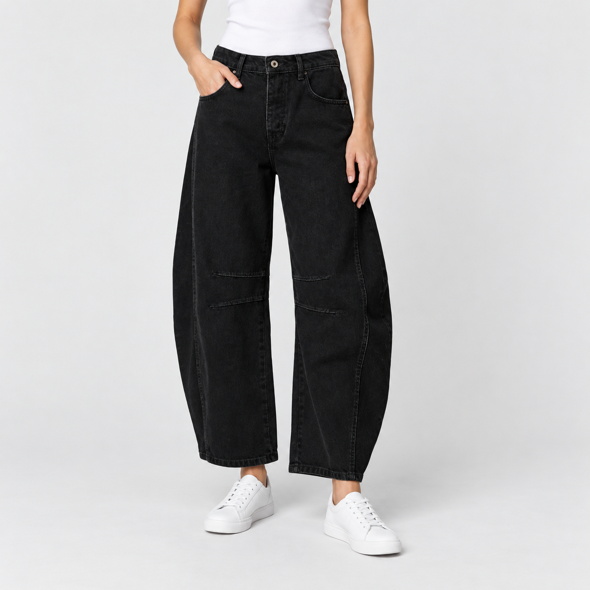 Relaxed Mid Rise Cropped Barrel Leg Jeans in Black, worn on a model.