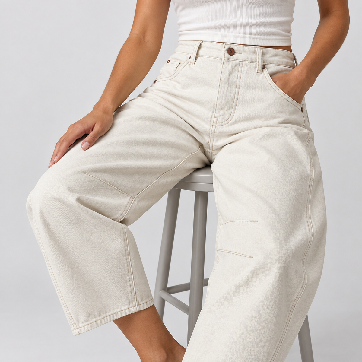 Relaxed Mid Rise Cropped Barrel Leg Jeans in White, worn on a model.