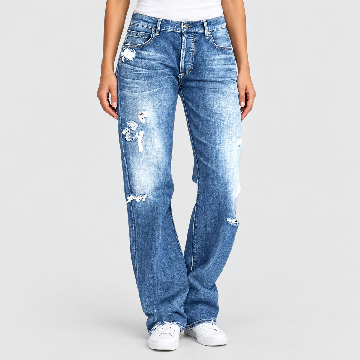 Relaxed Low Rise Distressed Wide Leg Jeans in Blue, worn on a model.
