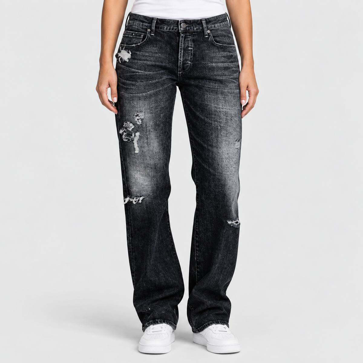 Relaxed Low Rise Distressed Wide Leg Jeans in Black, worn on a model.