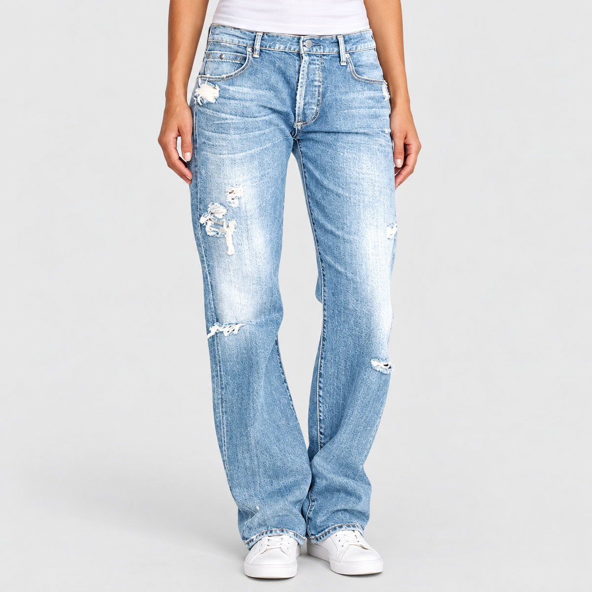 Relaxed Low Rise Distressed Wide Leg Jeans in Light Blue, worn on a model.