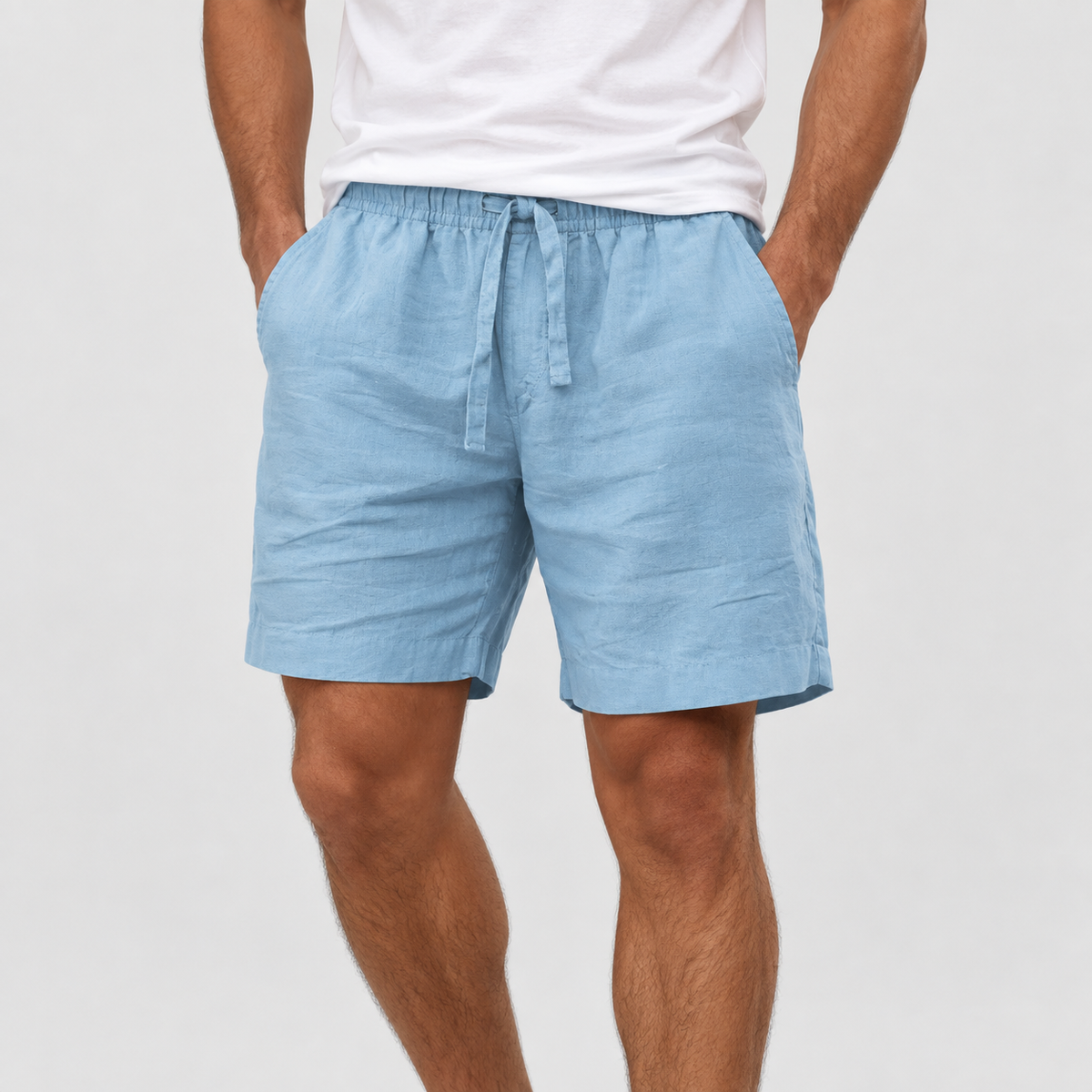 Relaxed Fit Drawstring Shorts in Light Blue, worn on a model.