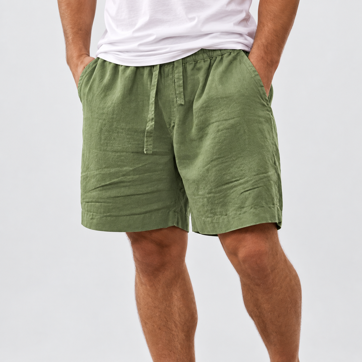 Relaxed Fit Drawstring Shorts in Green, worn on a model.