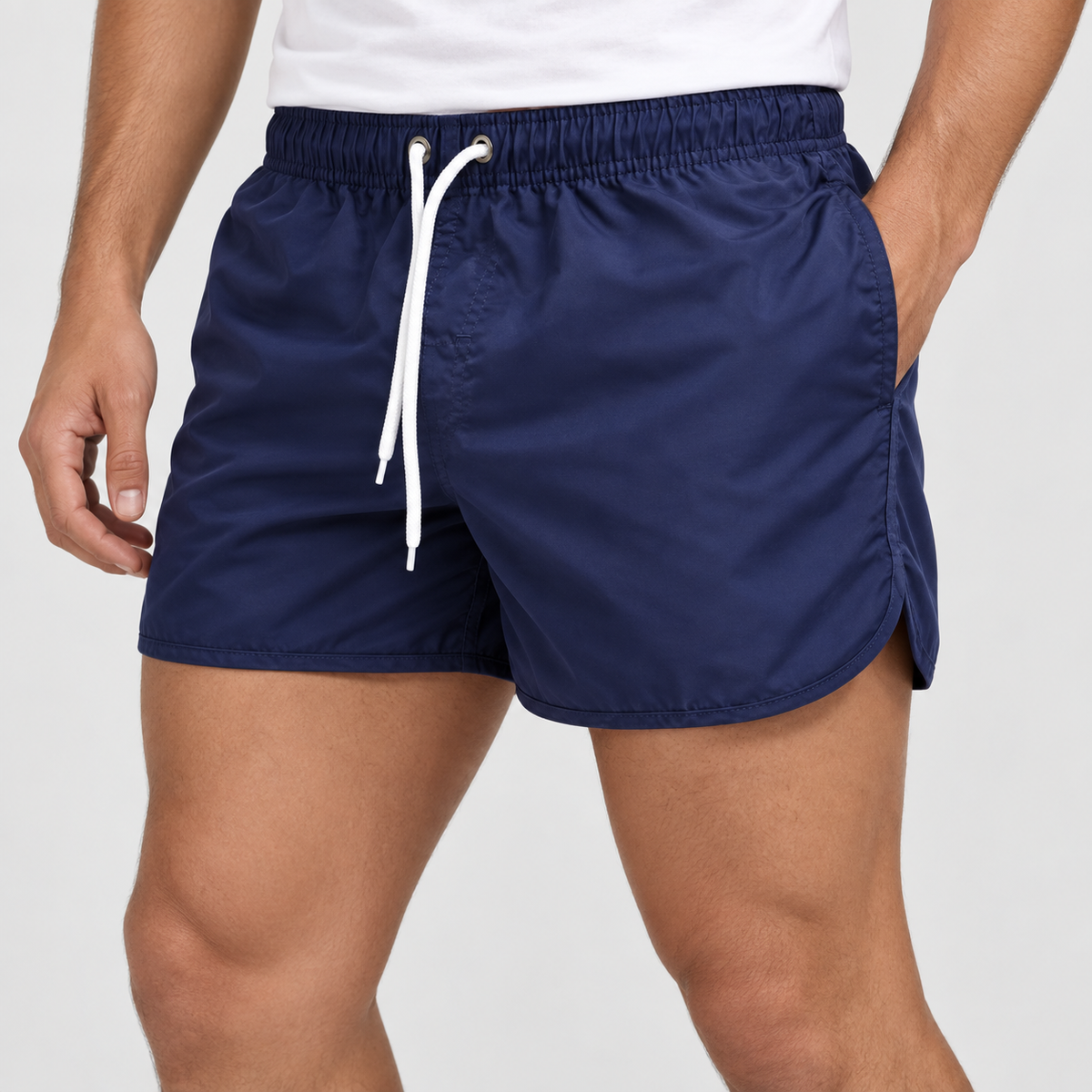 Relaxed Fit Drawstring Swim Shorts in Dark Blue, worn on a model.