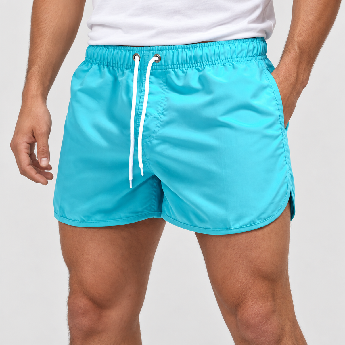 Relaxed Fit Drawstring Swim Shorts in Sky Blue, worn on a model.