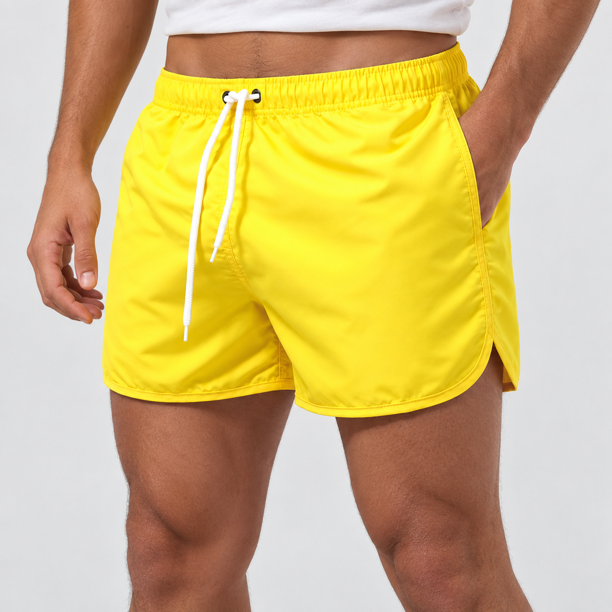 Relaxed Fit Drawstring Swim Shorts in Yellow, worn on a model.