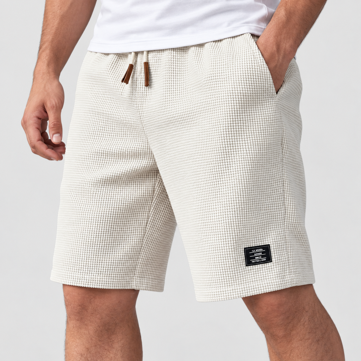 Relaxed Fit Waffle Texture Drawstring Shorts, worn on a model.