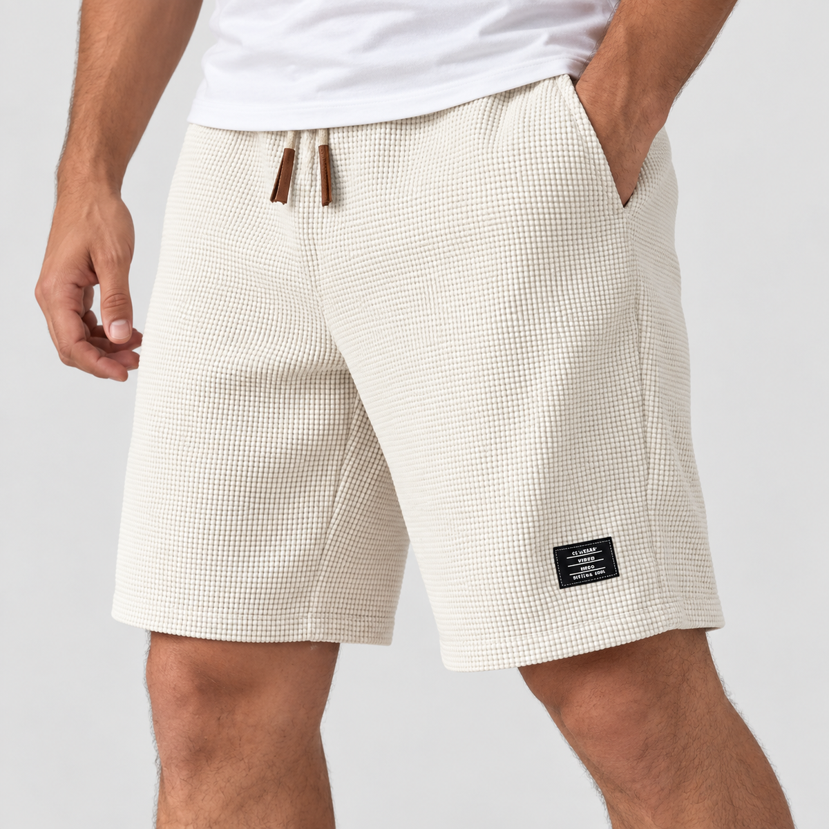 Relaxed Fit Waffle Texture Drawstring Shorts, worn on a model.