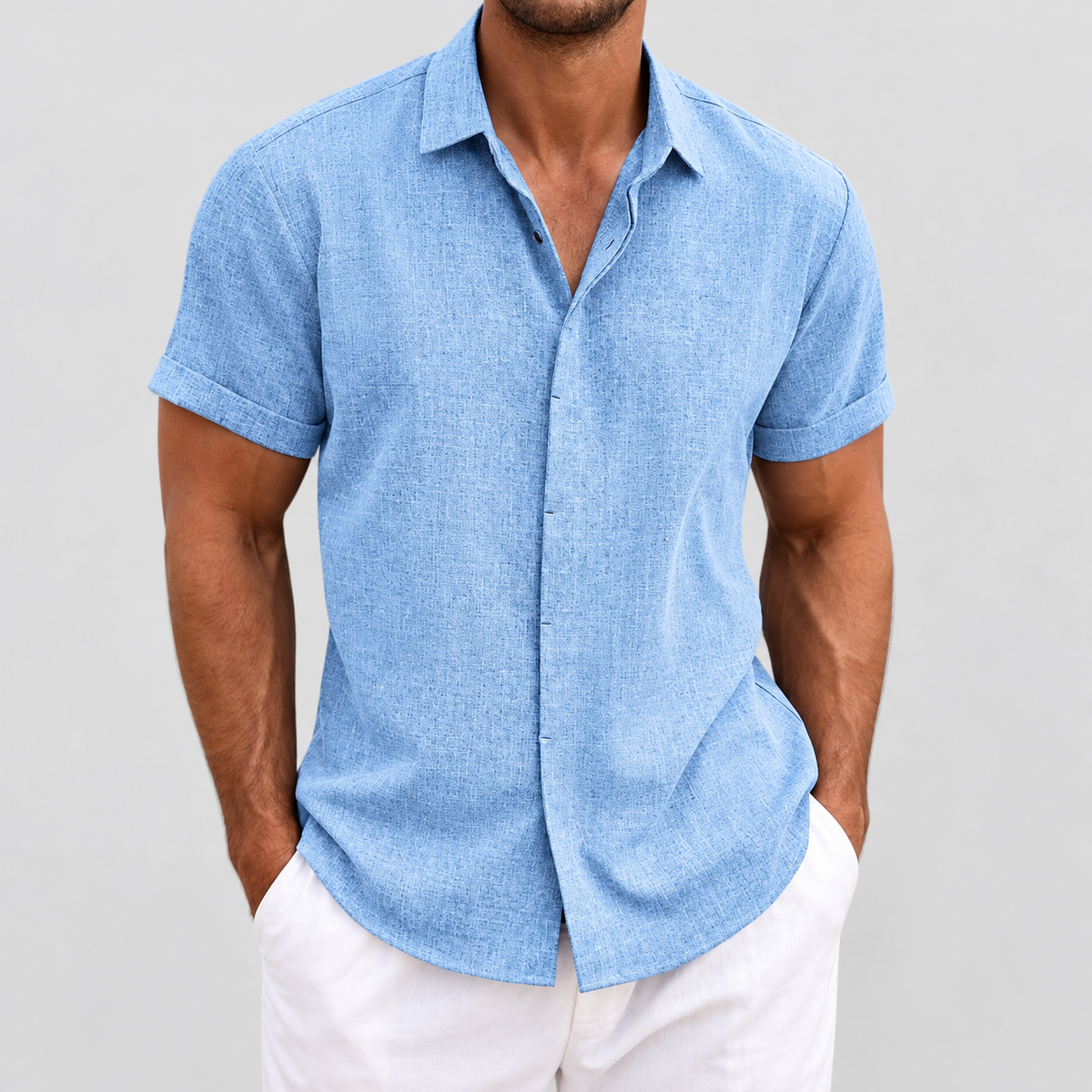 Relaxed Fit Short Sleeve Button Up Shirt in Light Blue, worn on a model.