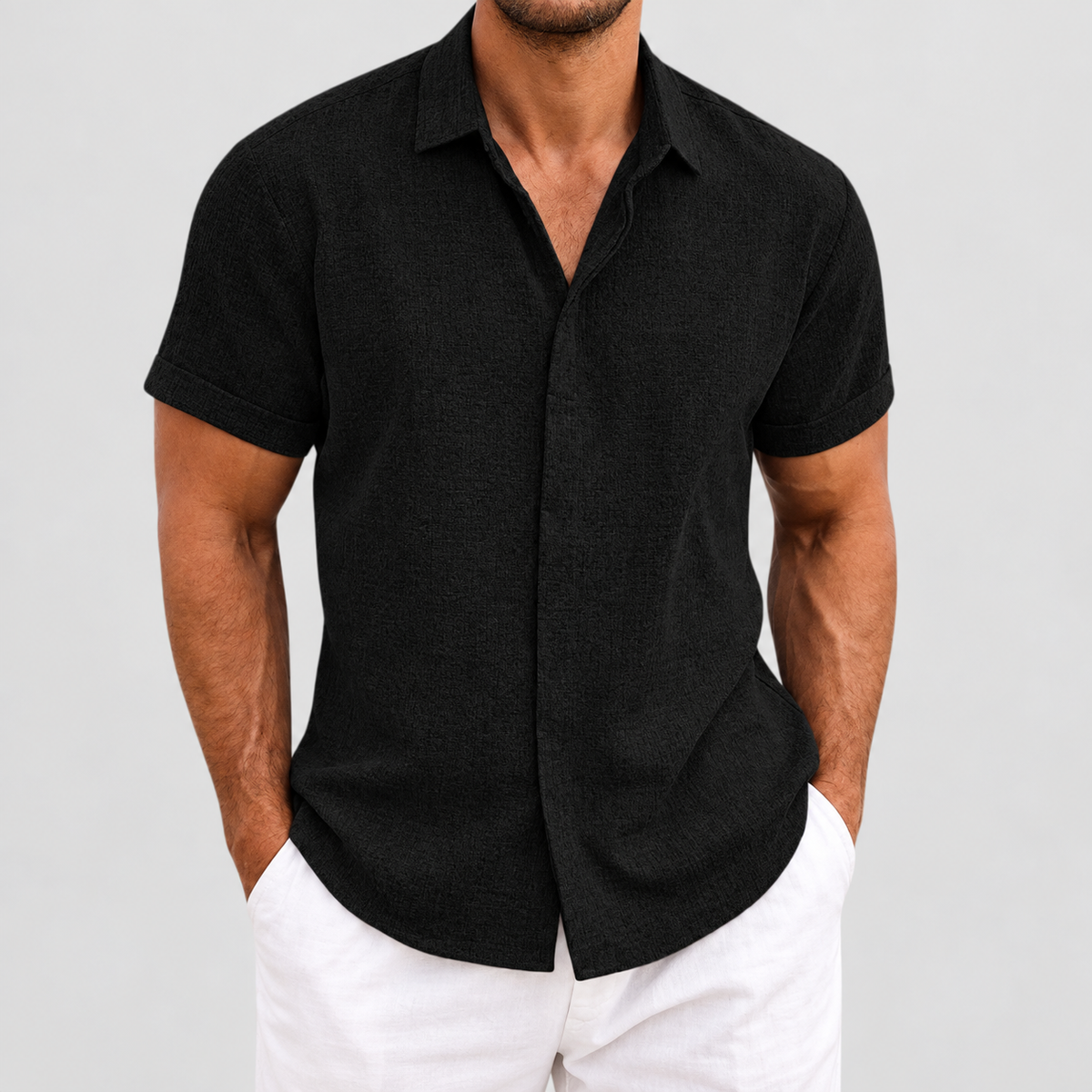 Relaxed Fit Short Sleeve Button Up Shirt in Black, worn on a model.