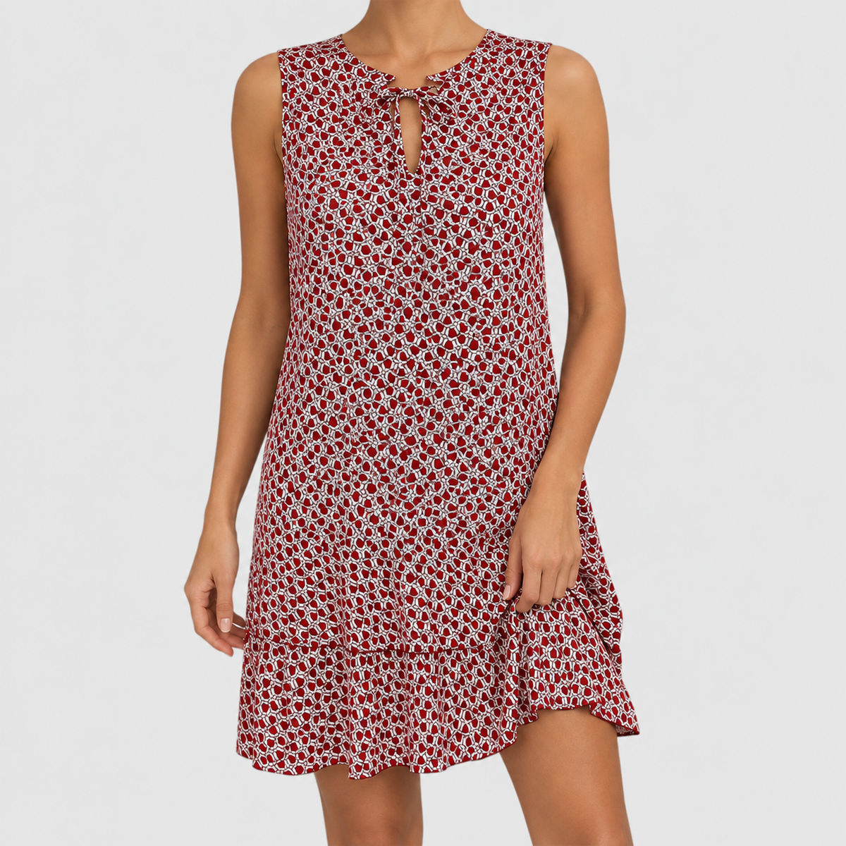 Sleeveless Printed Shift Mini Dress with Neck Tie in Red, worn on a model.