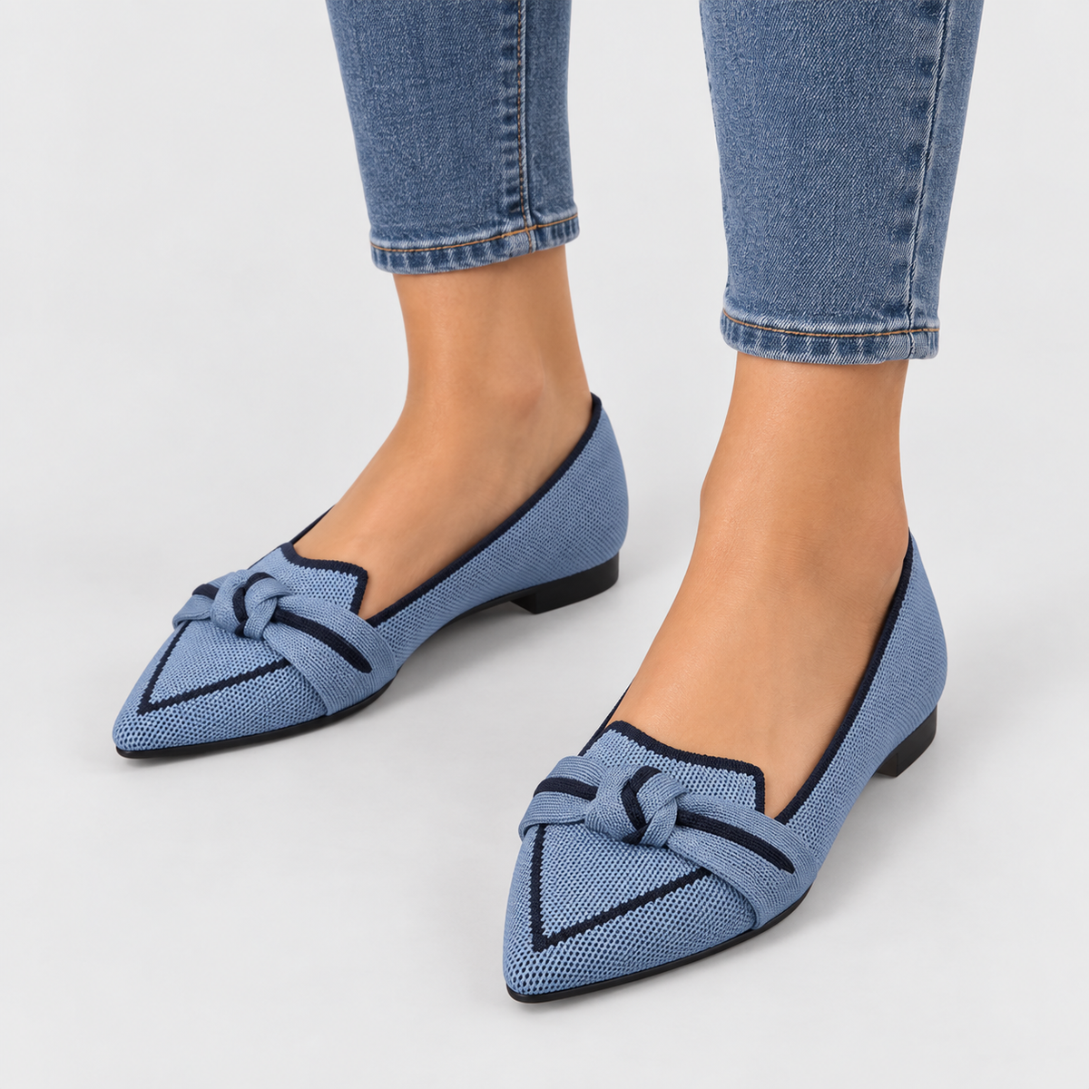 Pointed Toe Knit Ballet Flats with Bow Detail in Light Blue, worn on a model.