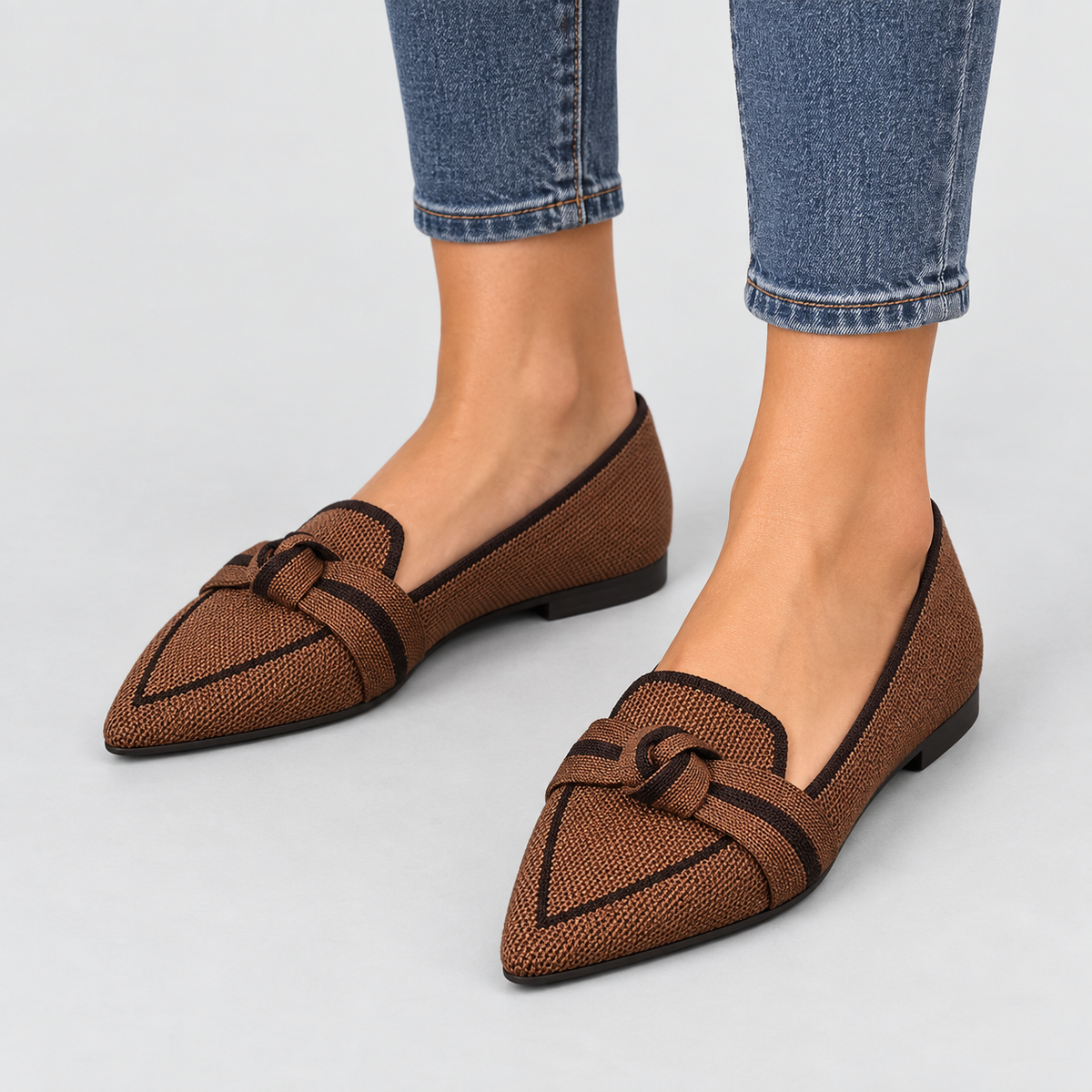 Pointed Toe Knit Ballet Flats with Bow Detail in Brown, worn on a model.