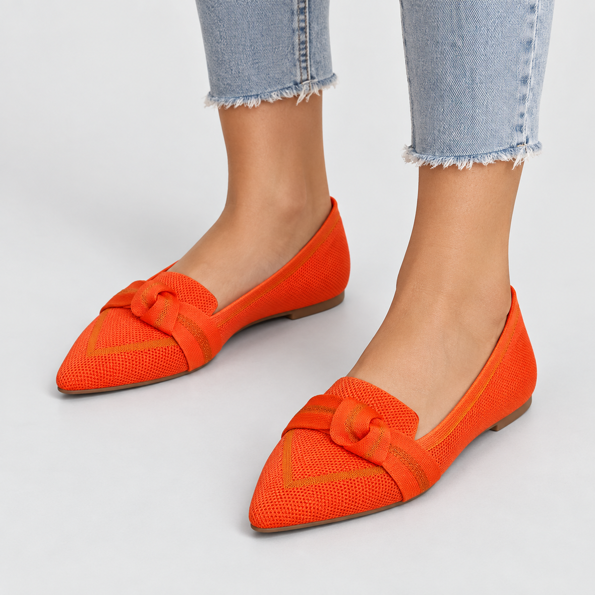 Pointed Toe Knit Ballet Flats with Bow Detail in Orange, worn on a model.